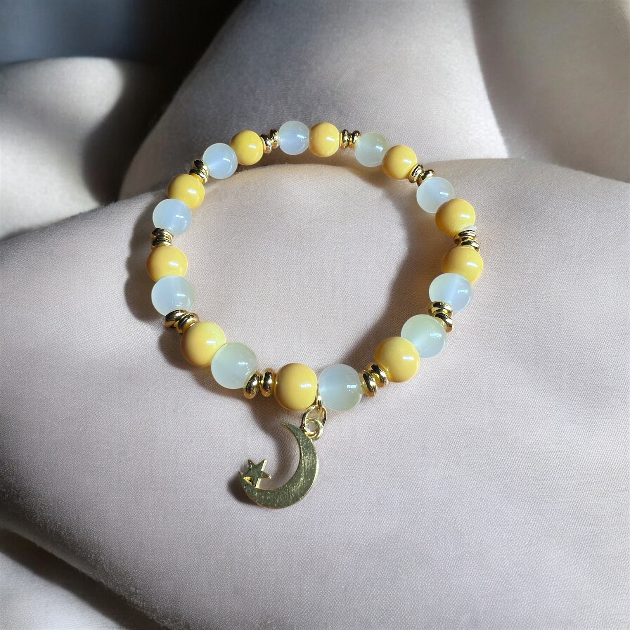 Yellow and White Glass Beads with Moon and Star Charm