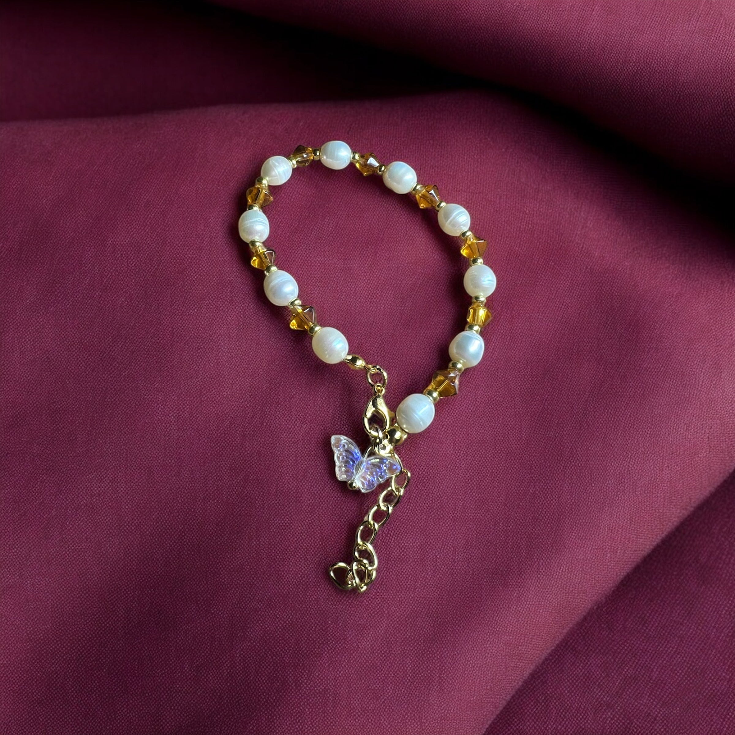 Peal and Gold Cystal with Butterfly Charm